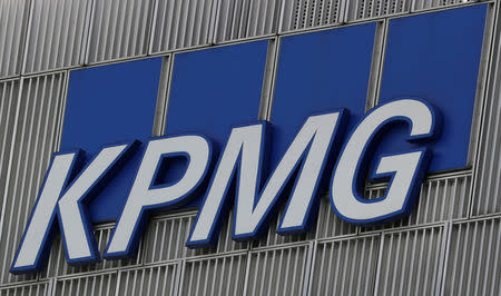 FILE PHOTO: The KPMG logo is seen at their offices at Canary Wharf financial district in London,Britain, March 3, 2016. REUTERS/Reinhard Krause/File Photo