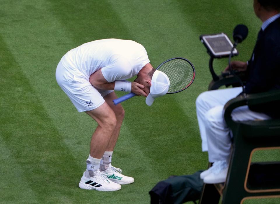 Andy Murray reacts to losing a point during his defeat to big-serving American John Isner (Zac Goodwin/PA) (PA Wire)