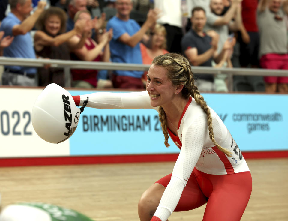 Laura Kenny of England celebrates during the women's 10km scratch race final during the Commonwealth Games track cycling at Lee Valley VeloPark in London, Monday, Aug. 1, 2022. (AP Photo/Ian Walton)