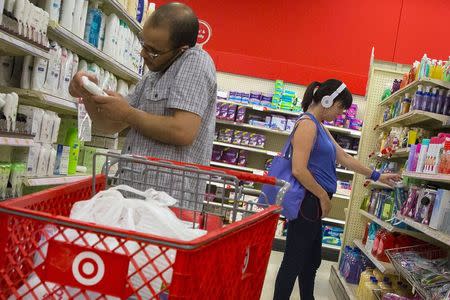 Customers shop in the pharmacy department of a Target store in the Brooklyn borough of New York June 15, 2015. REUTERS/Brendan McDermid