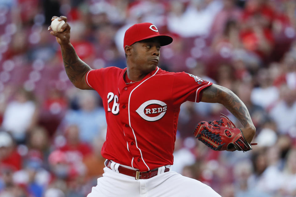 Raisel Iglesias signed a three-year deal with the Reds, but a trade could still happen. (AP Photo/John Minchillo)