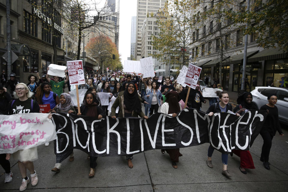 Protestors&nbsp;carry a "Black Lives Matter" banner in Seattle during a student walkout protest following Trump's election, Nov. 14, 2016. (Photo: JASON REDMOND/AFP/Getty Images)