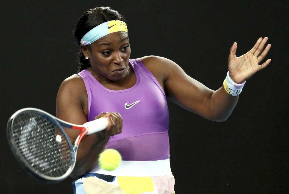 FILE - In this Jan. 20, 2020, file photo, Sloane Stephens makes a forehand return to China's Zhang Shuai during their first round singles match at the Australian Open tennis championship in Melbourne, Australia. If World TeamTennis gets its way, Grand Slam champions Sofia Kenin and Sloane Stephens could be among the first tennis players to compete in front of fans after the coronavirus pandemic prompted lockdowns around the globe. WTT said Tuesday, May 26, 2020, it is planning to allow up to 500 spectators at each of its outdoor matches during a three-week season from July 12 to Aug. 2 at a resort in West Virginia. (AP Photo/Dita Alangkara, File)