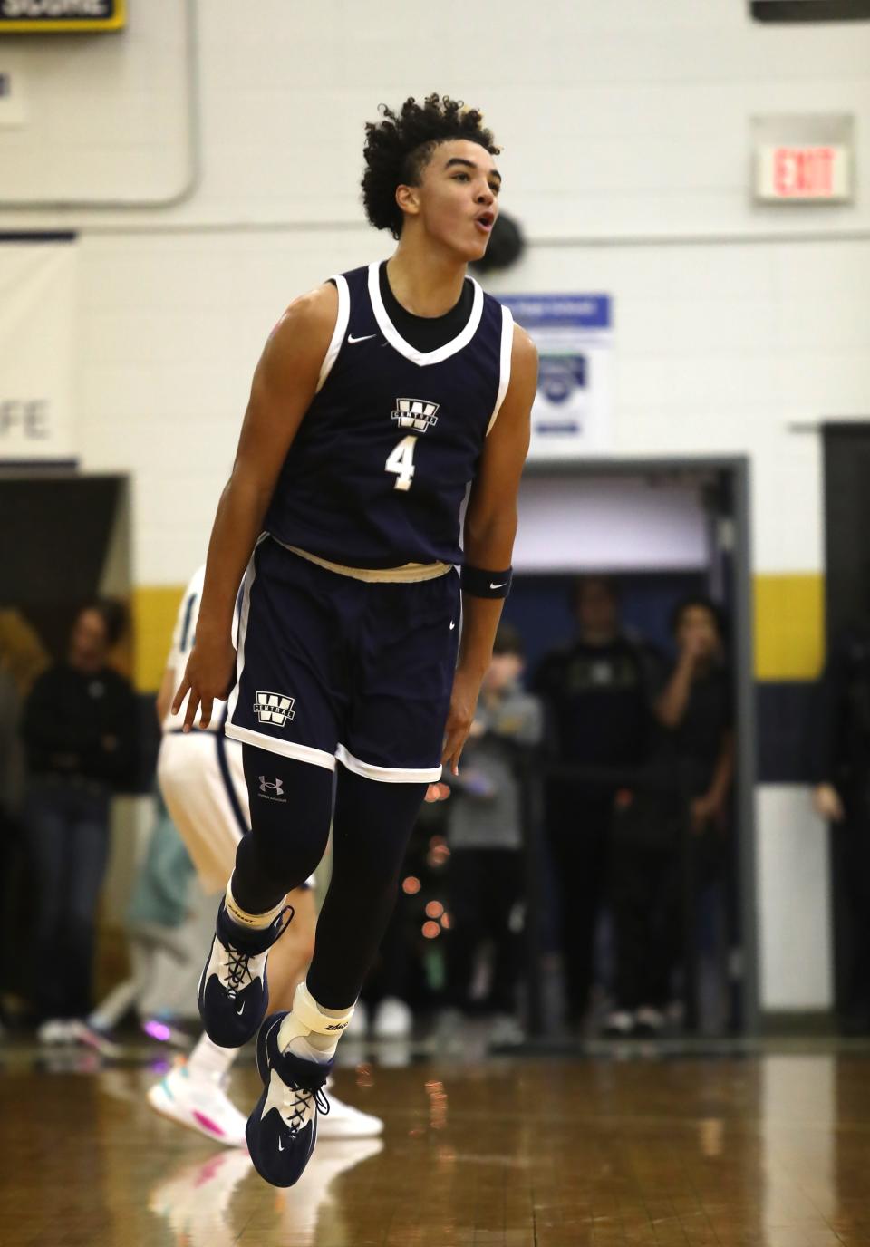 Warren Central’s Kade Unseld celebrates making a bucket against Great Crossing.Dec. 20