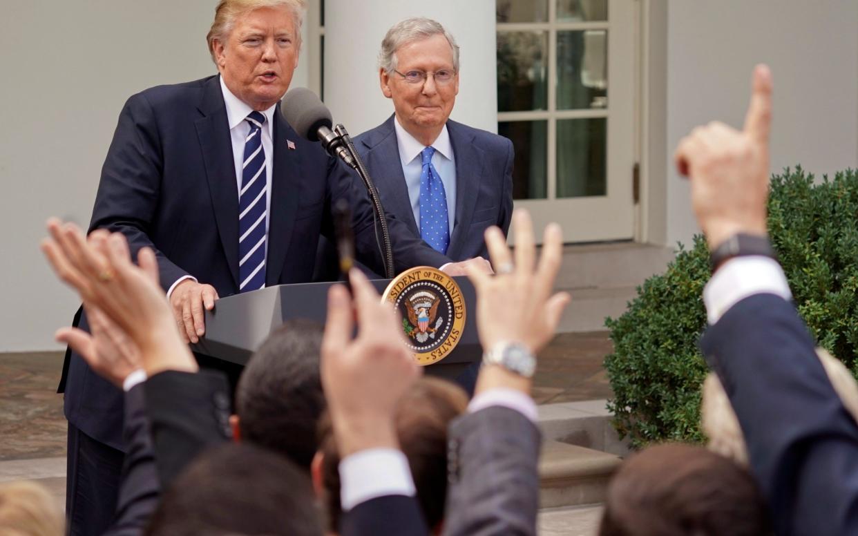 Donald Trump, the US President, takes questions at a White House press conference - AP