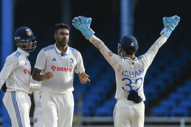 Main man: Ravichandran Ashwin (centre) celebrates the dismissal of Kirk McKenzie (Randy Brooks)