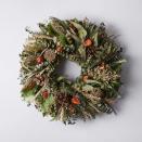 <p>food52.com</p><p><strong>$105.00</strong></p><p>This autumnal wreath is a great transitional pieces for taking your door decor from the late days of fall to the holidays. </p>