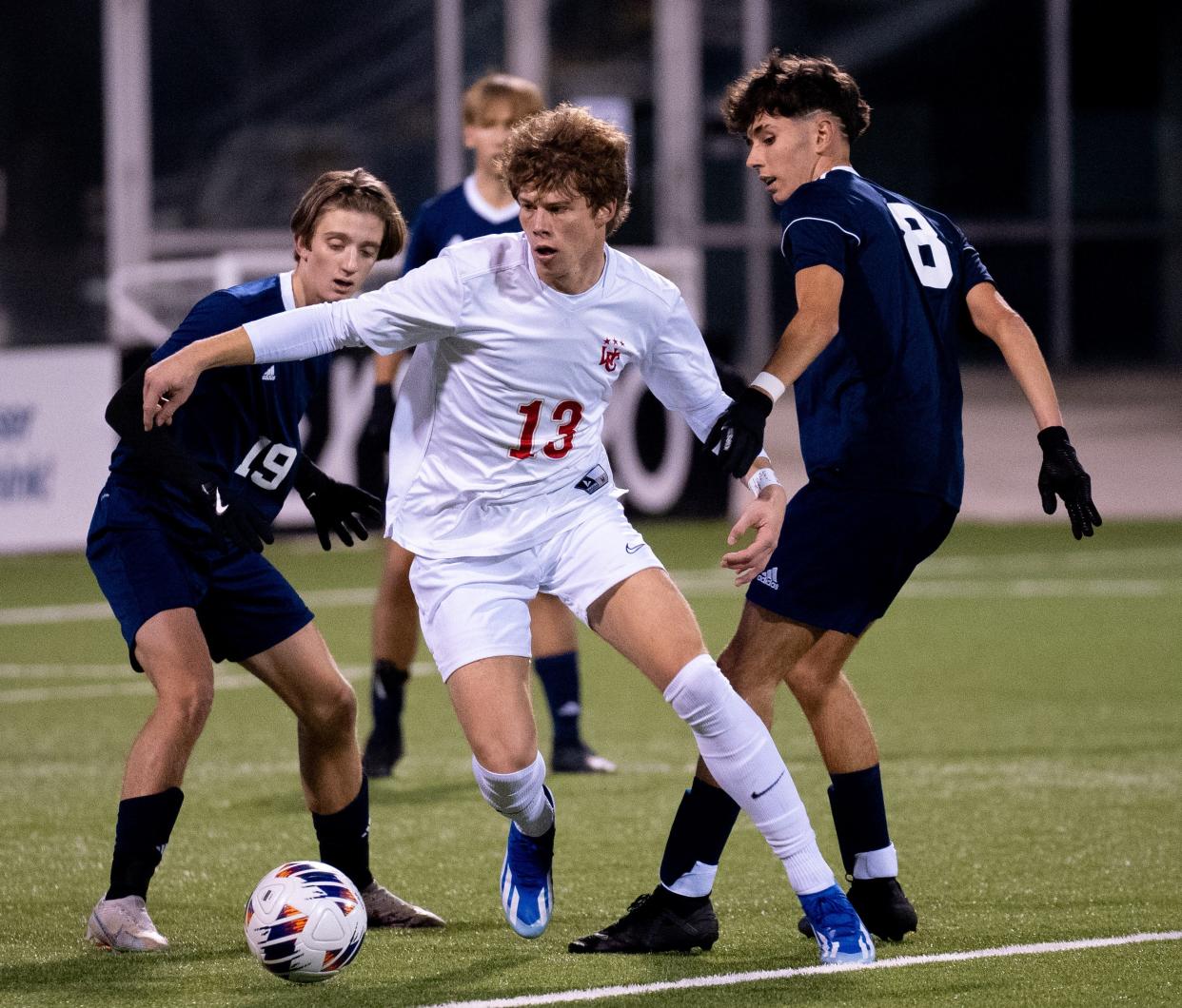 Worthington Christian's Ben Jende battles Willoughby Andrews Osborne in the Division III state final Nov. 11 at Historic Crew Stadium. The Warriors are dropping down to Division IV for the 2024 season.