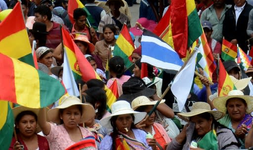 Pro-government Quechua indigenous women rallied in Cochabamba, where demonstrators fought a pitched battle with government opponents