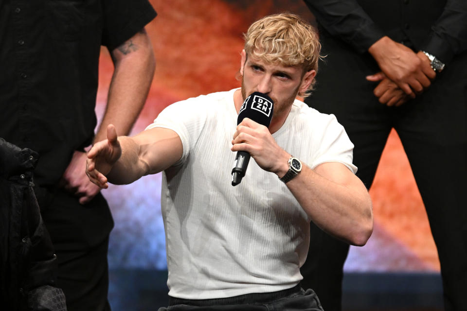 MANCHESTER, ENGLAND - OCTOBER 12: Logan Paul reacts during a KSI v Tommy Fury - Prime Card Press Conference at Manchester Central on October 12, 2023 in Manchester, England. (Photo by Ben Roberts Photo/Getty Images)