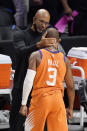 Phoenix Suns head coach Monty Williams, left, embraces Chris Paul as time runs out in Game 6 of the NBA basketball Western Conference Finals against the Los Angeles Clippers Wednesday, June 30, 2021, in Los Angeles. The Suns won the game 130-103 to take the series 4-2. (AP Photo/Mark J. Terrill)