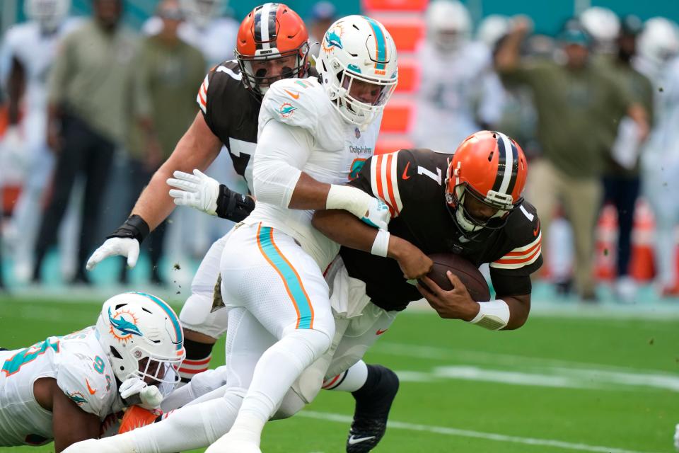 Dolphins linebacker Bradley Chubb (2) and Christian Wilkins sack Jacoby Brissett of the Browns.