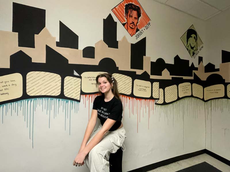 Kaylee Kramer of Burlington and the mural she painted (Girl Scouts of Eastern Iowa and Western Illinois)