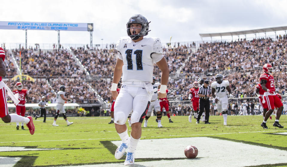 Central Florida quarterback Dillon Gabriel (11) celebrates after scoring against Houston  during the first half of an NCAA college football game in Orlando, Fla., Saturday, Nov. 2, 2019. (Photo/Willie J. Allen Jr.)