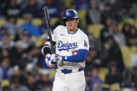 Los Angeles Dodgers' Shohei Ohtani walks up to bat during the first inning of the team's baseball game against the San Diego Padres, Saturday, April 13, 2024, in Los Angeles. (AP Photo/Marcio Jose Sanchez)