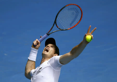 Britain's Andy Murray serves during a training session ahead of the Australian Open tennis tournament in Melbourne, Australia, January 14, 2017. REUTERS/Edgar Su