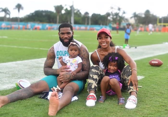 Xavien Howard, pictured with his two daughters and girlfriend Keli Long, is expecting a son next year. (Special to Yahoo Sports)