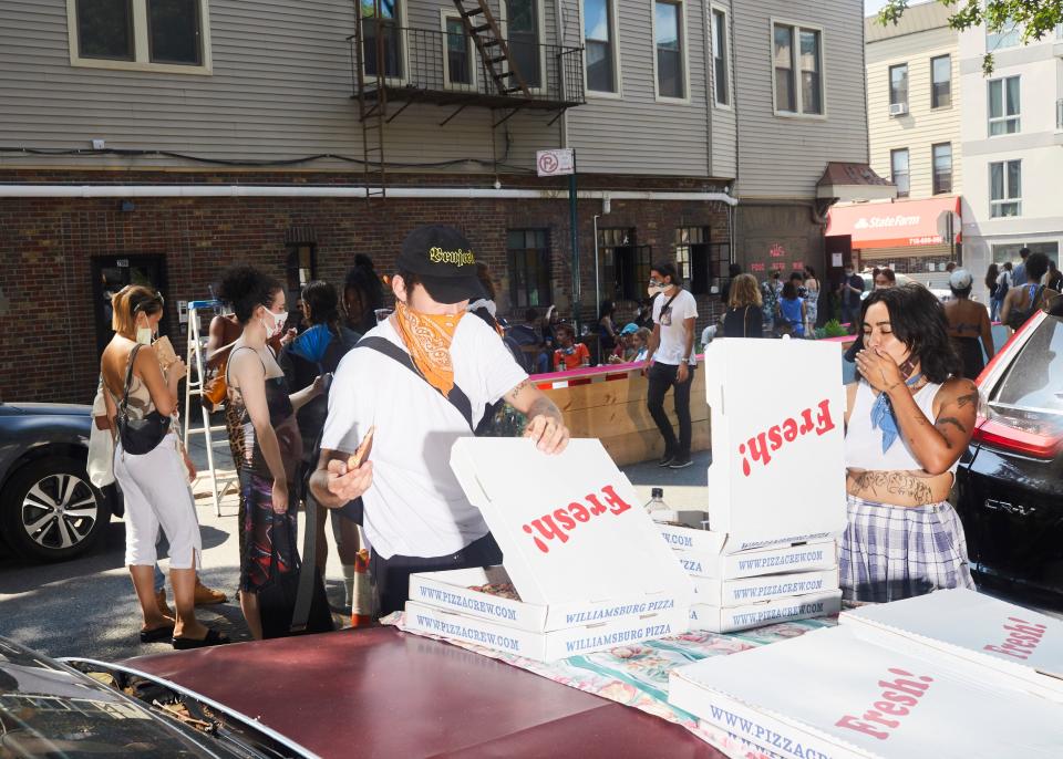 Williamsburg Pizza donated some pies to the sale.