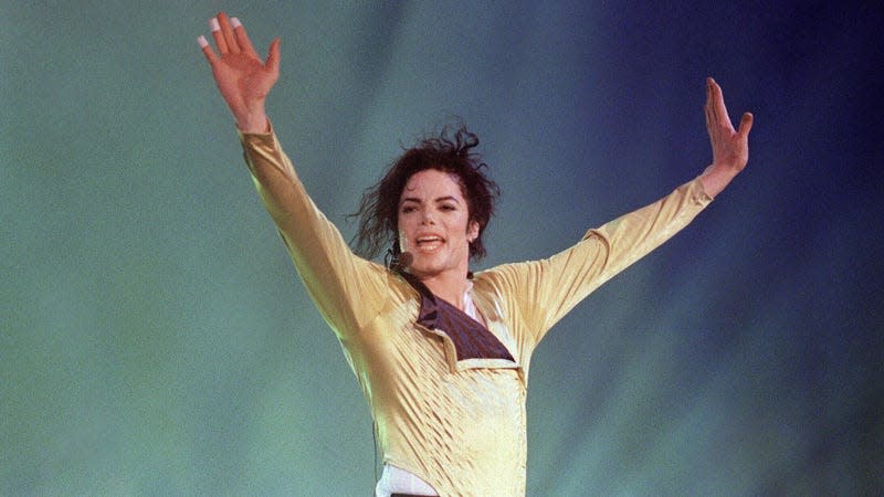 Michael Jackson preforms before an estimated audience of 60,000 in Brunei on July 16, 1996.
