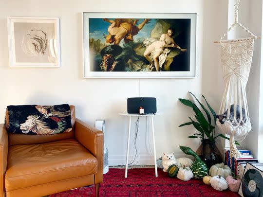 A Samsung The Frame TV that shows TV and beautiful works of art