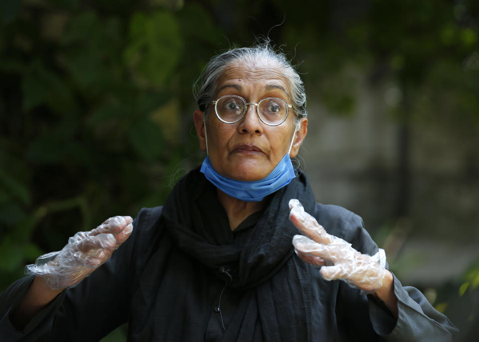 Tahira Abdullah, a human rights activist, speaks during an interview with The Associated Press, in Islamabad, Pakistan, Saturday, July 11, 2020. Abdullah has courted the wrath of extremists by championing the country’s minorities, marching for their rights and women’s rights. Analysts and activists say minorities in Pakistan are increasingly vulnerable to Islamic extremists as Prime Minister Imran Khan vacillates between trying to forge a pluralistic nation and his conservative Islamic beliefs. (AP Photo/Anjum Naveed)