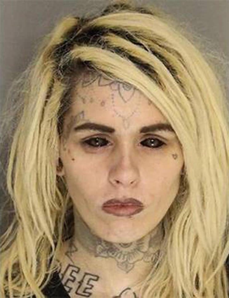 The photo of a woman arrested for armed robbery has gone viral, thanks to her solid-black eyeballs. (Photo: Lancaster County Sheriff’s Department, S.C.)