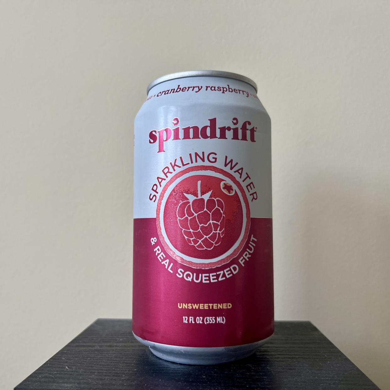 a can of cranberry raspberry spindrift sparkling water