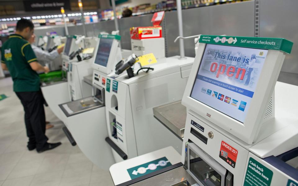 A group of MPs has made the suggestion of a transaction fee on self-service checkouts in a report on social integration - Simon Dawson/Bloomberg