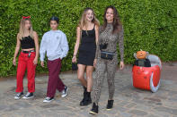 <p>Brooke Burke, son Shaya, daughter Heaven Rain and their friend got an early start on Halloween on Friday, ensuring they could trick or treat contact-free by using the gita robot to do the heavy candy lifting.</p>