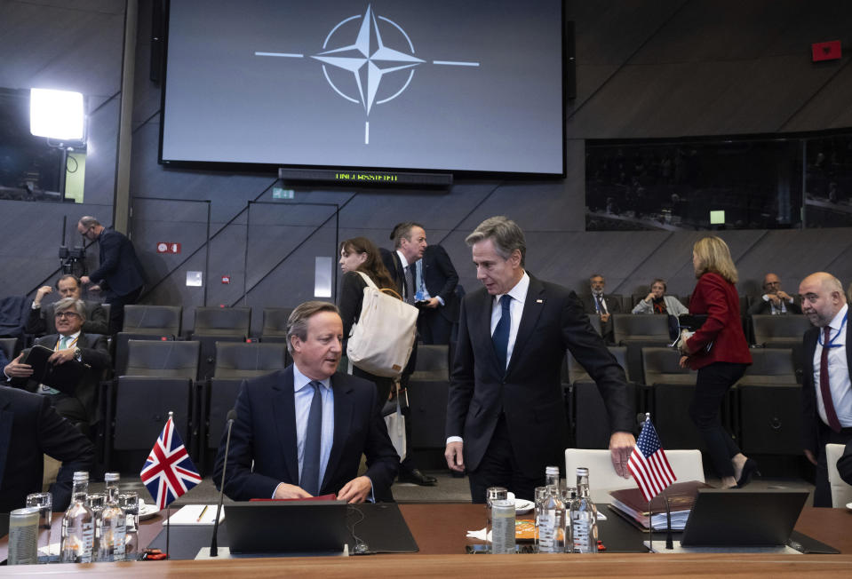 British Foreign Secretary David Cameron, left, speaks with US Secretary of State Antony Blinken during the NATO Foreign Ministers meeting at the NATO Headquarters in Brussels, Belgium, Tuesday, Nov. 28, 2023. (Saul Loeb/Pool Photo via AP)