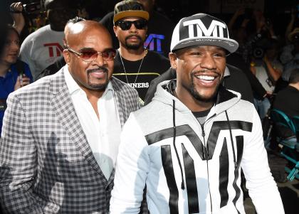 Leonard Ellerbe (L) and Floyd Mayweather appear at a fan event in April prior to Mayweather's bout with Manny Pacquiao. (Photo by Ethan Miller/Getty Images)