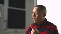 In this Nov. 22, 2019, photo provided by Ajinomoto, chef Eddie Huang is seen in New York filming a video for a campaign challenging Merriam-Webster's dictionary entry of "Chinese restaurant syndrome." Huang, a New York City-based chef and author (his memoir inspired the ABC sitcom “Fresh Off the Boat”), and TV's “The Real” co-host Jeannie Mai are launching a social media effort Tuesday with Ajinomoto, the longtime Japanese producer of MSG seasonings. They plan to use the hashtag #RedefineCRS to challenge Merriam-Webster to rewrite the definition. (Courtesy of Ajinomoto via AP)