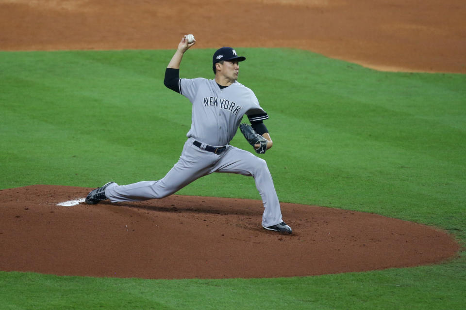 Oct 12, 2019; Houston, TX, USA; New York Yankees starting pitcher Masahiro Tanaka (19) throws against the Houston Astros in the first inning in game one of the 2019 ALCS playoff baseball series at Minute Maid Park. Mandatory Credit: Thomas B. Shea-USA TODAY Sports