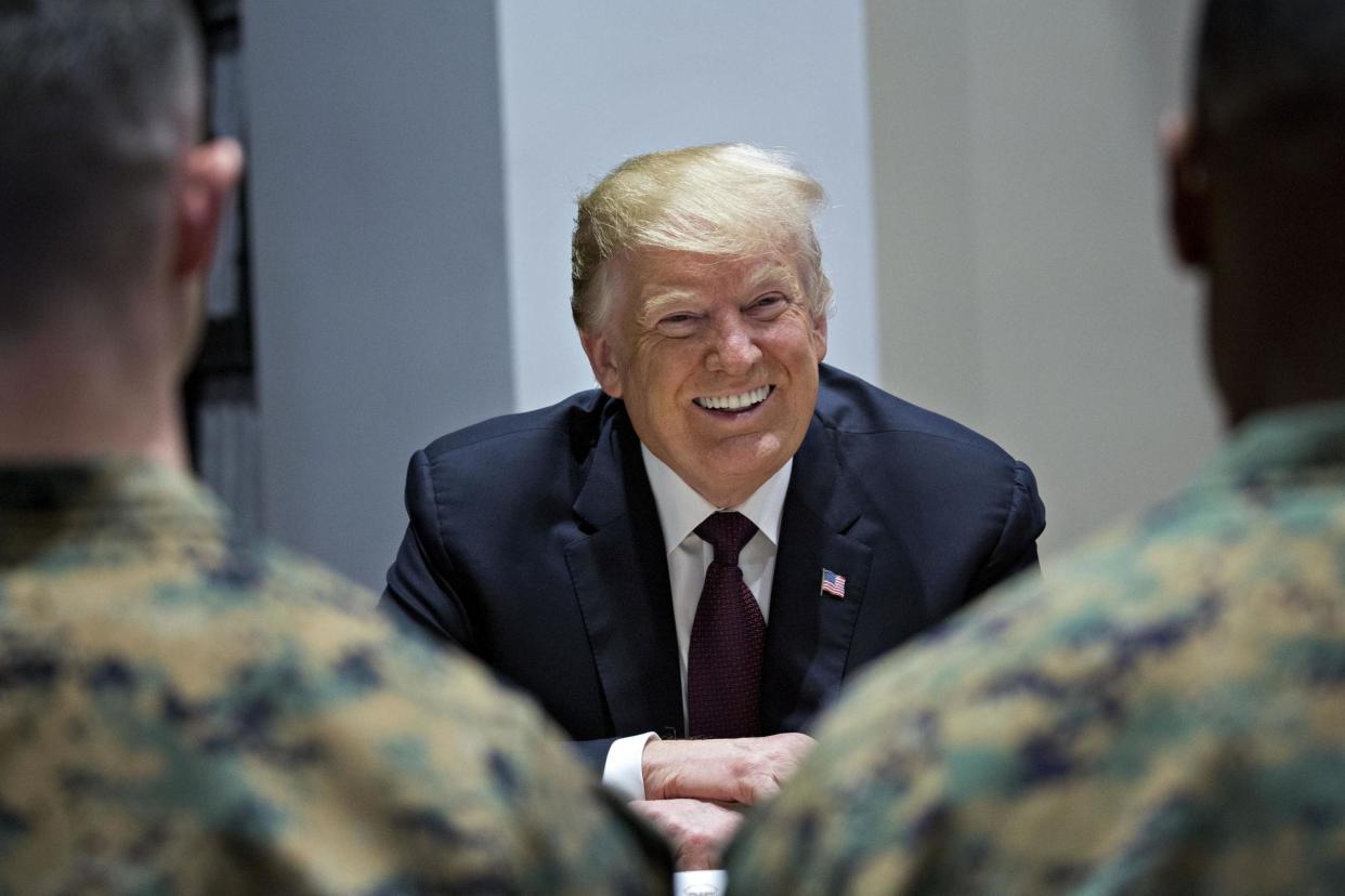 President Donald Trump comes under fire for being 'too afraid' to visit US troops in combat zones: Getty