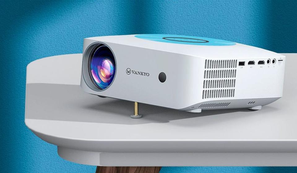 A Vankyo 1080p projector sitting on a table.
