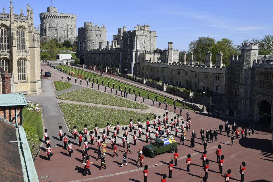 The coffin arrives at St George's Chapel for the funeral of Britain's Prince Philip inside Windsor Castle in Windsor, England, Saturday, April 17, 2021. Prince Philip died April 9 at the age of 99 after 73 years of marriage to Britain's Queen Elizabeth II. (Justin Tallis/Pool via AP)