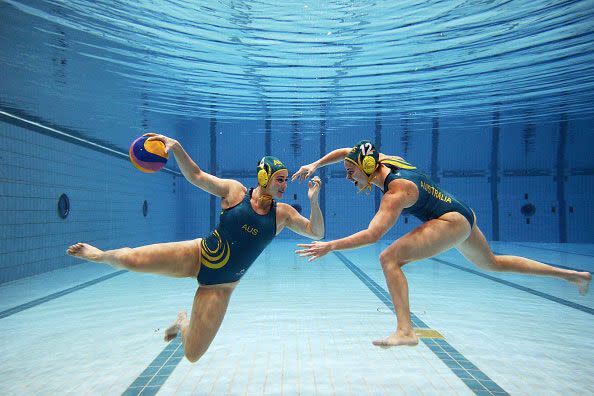 Holly Lincoln-Smith (L) and Nicola Zagame (R) pose during a Australian Women's Olympic Water Polo Team portrait session. Photo: Getty