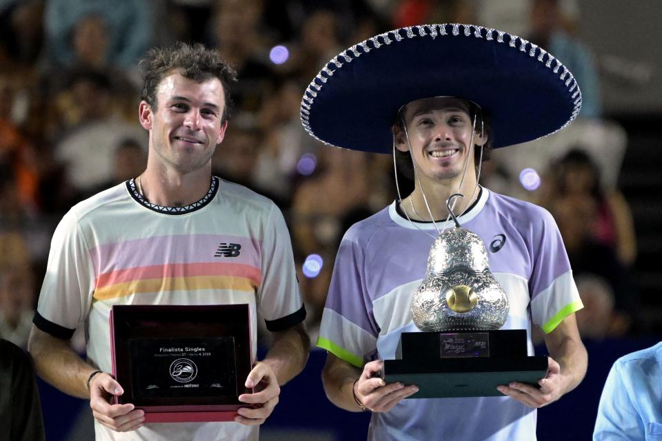 Alex de Minaur and Tommy Paul, pictured here with their trophies after the Mexican Open final.