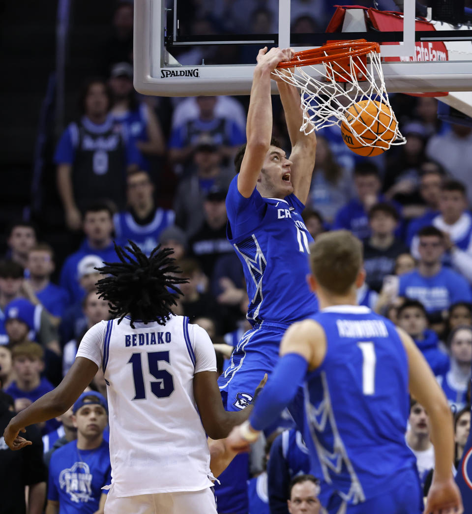 Creighton center Ryan Kalkbrenner (11) dunks against Seton Hall during the second half of an NCAA college basketball game in Newark, N.J. Saturday, Jan. 20, 2024. Creighton won 97-94 in triple overtime. (AP Photo/Noah K. Murray)