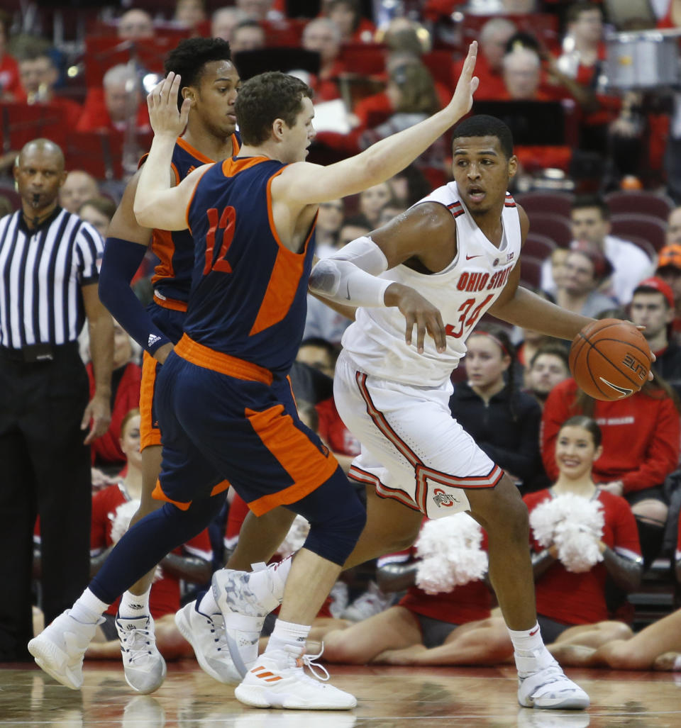 Ohio State's Kaleb Wesson, right, posts up against Bucknell's Paul Newman, left, and John Meeks during the first half of an NCAA college basketball game Saturday, Dec. 15, 2018, in Columbus, Ohio. (AP Photo/Jay LaPrete)