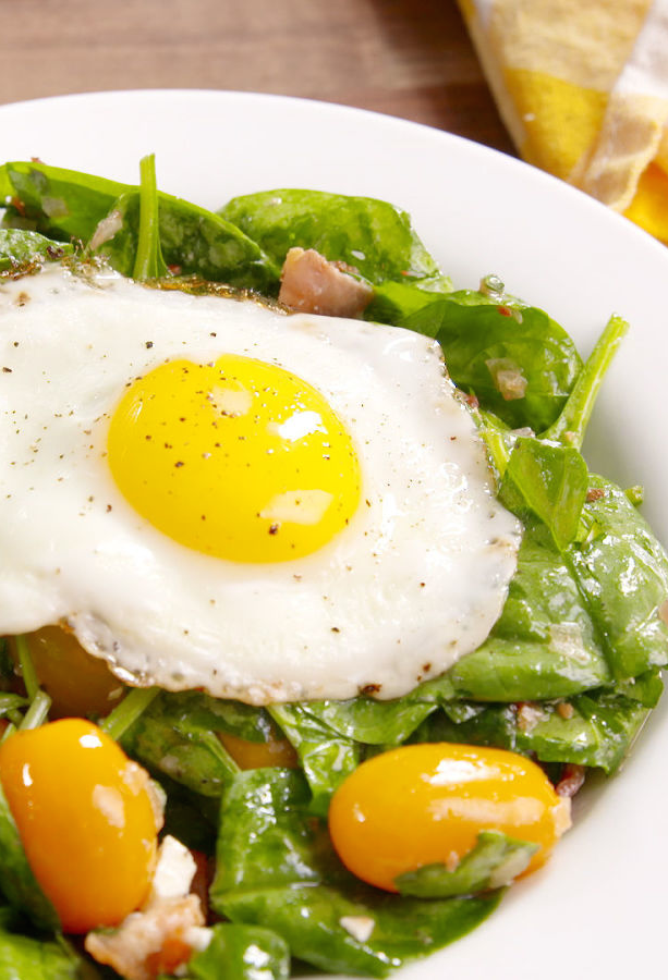 <p>Bacon vinaigrette + yolk = the most satisfying salad you'll ever eat.</p><p>Get the recipe from <a href="https://www.delish.com/cooking/recipe-ideas/recipes/a48540/breakfast-bacon-and-egg-salad-recipe/" rel="nofollow noopener" target="_blank" data-ylk="slk:Delish;elm:context_link;itc:0;sec:content-canvas" class="link ">Delish</a>.</p>