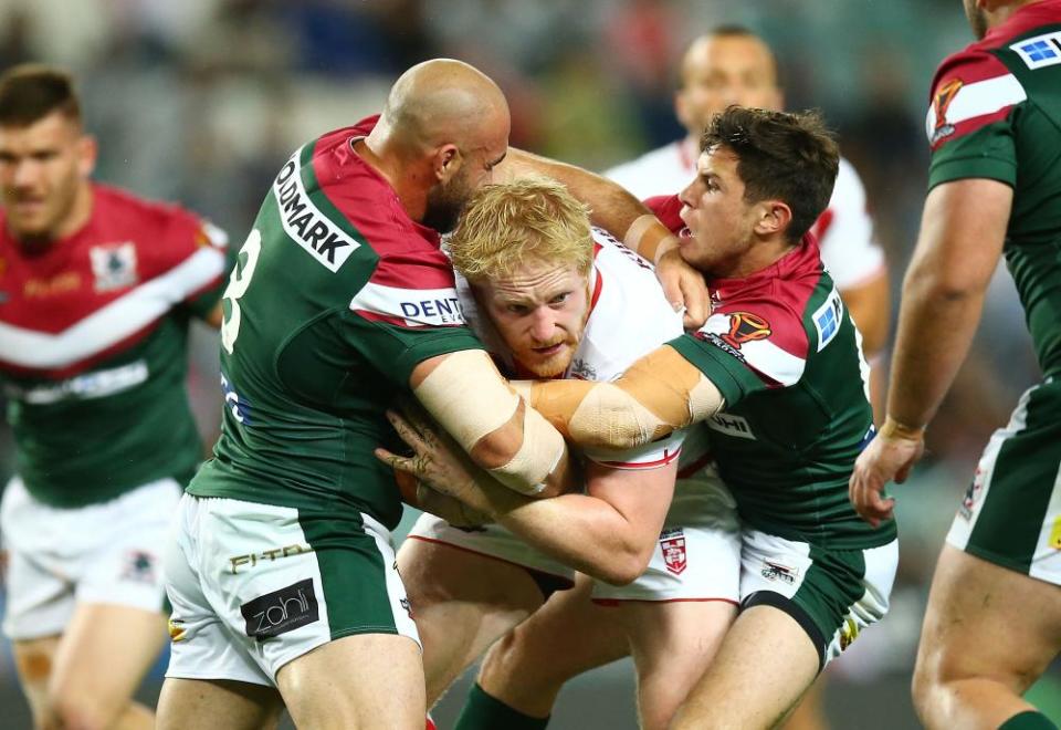 James Graham of England is tackled.