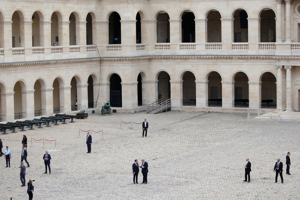 <p>French President Emmanuel Macron and President Donald Trump walk in the courtyard as they leave after a welcoming ceremony at the Invalides in Paris, France, July 13, 2017. (Photo: Charles Platiau/Reuters) </p>