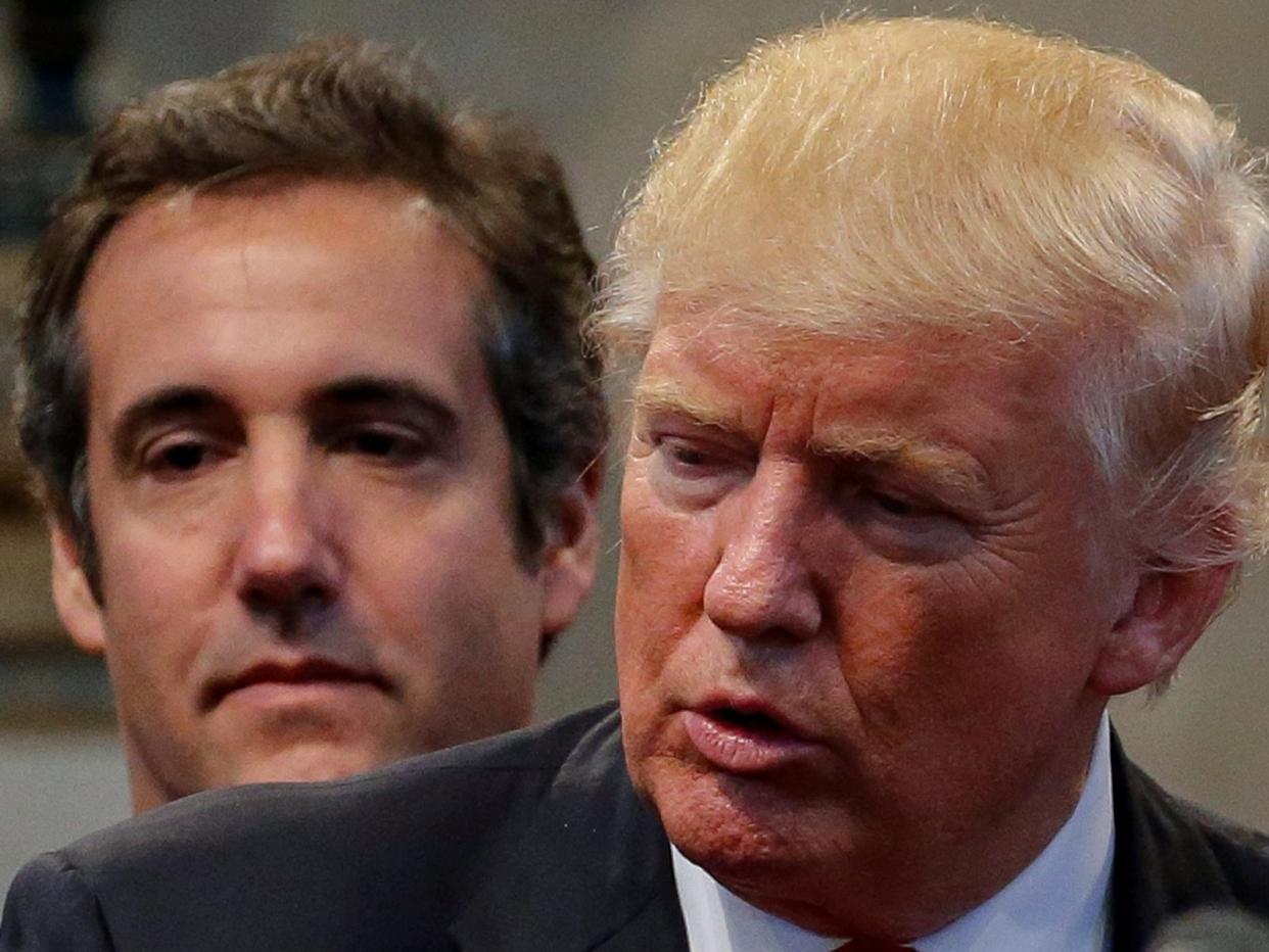 Donald Trump with his then personal lawyer Michael Cohen in September 2016. Prosecutors believe Cohen know where skeletons are rattling away about the president, his family and close associates: Reuters