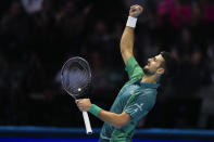 Serbia's Novak Djokovic reacts during his singles semifinal tennis match against Spain's Carlos Alcaraz of the ATP World Tour Finals at the Pala Alpitour, in Turin, Italy, Saturday, Nov. 18, 2023. (AP Photo/Antonio Calanni)