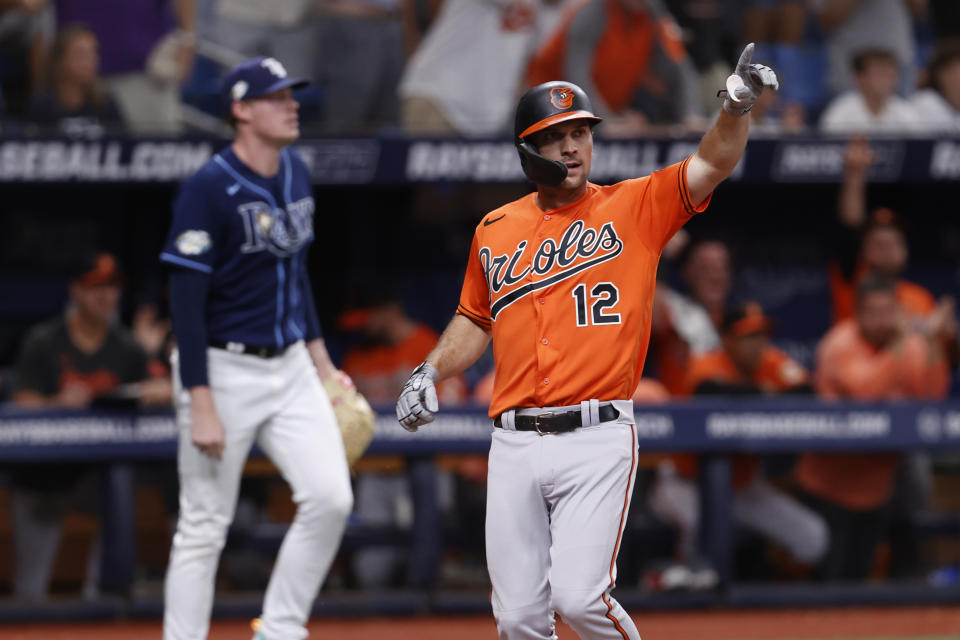 Baltimore Orioles' Adam Frazier reacts after scoring against the Tampa Bay Rays during the ninth inning of a baseball game Saturday, July 22, 2023, in St. Petersburg, Fla. (AP Photo/Scott Audette)