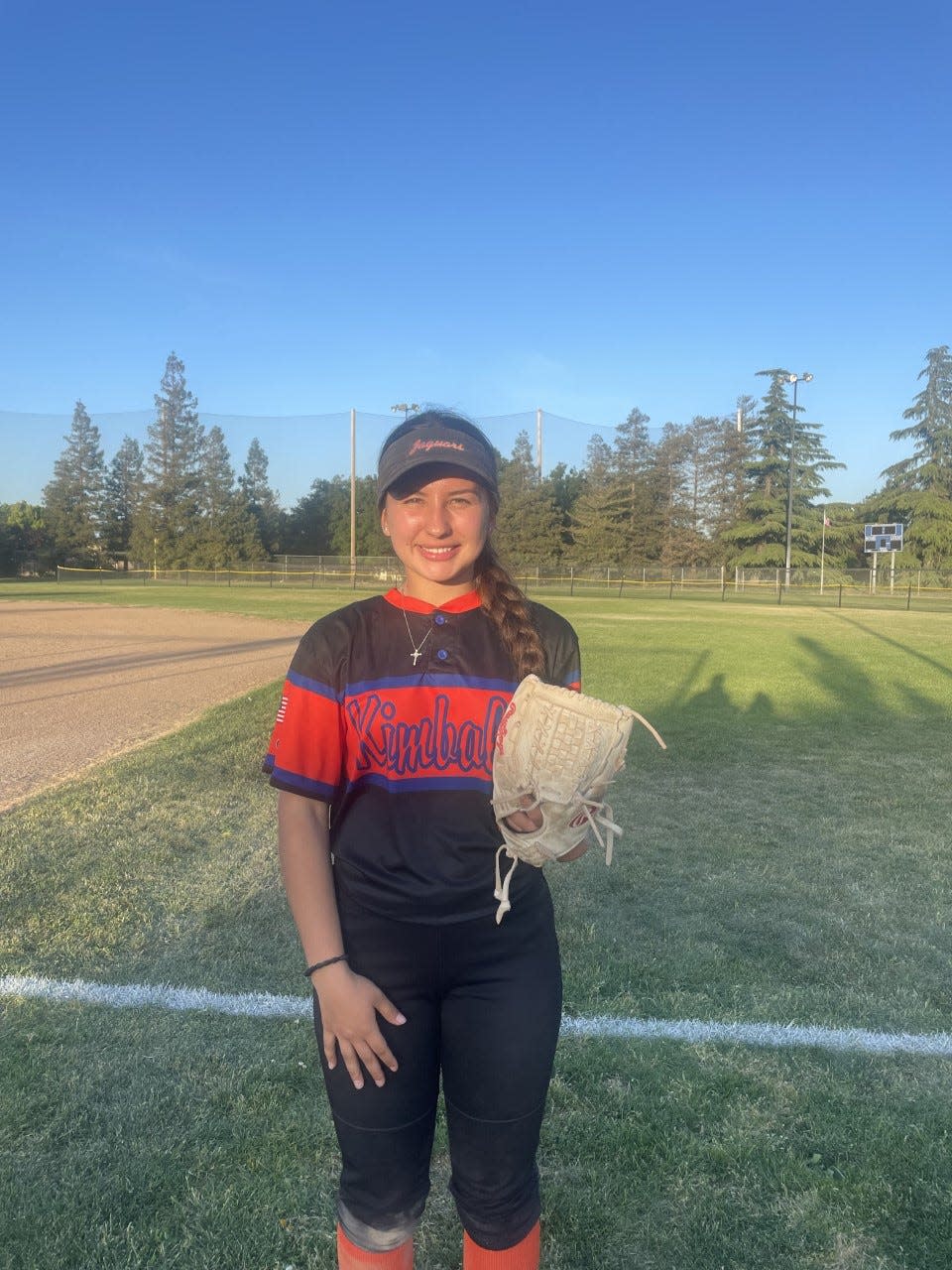 Elysia Duarte, junior third basemen for Kimball softball poses for a photo after Tuesday game against East Union at Northgate Park in Manteca.
