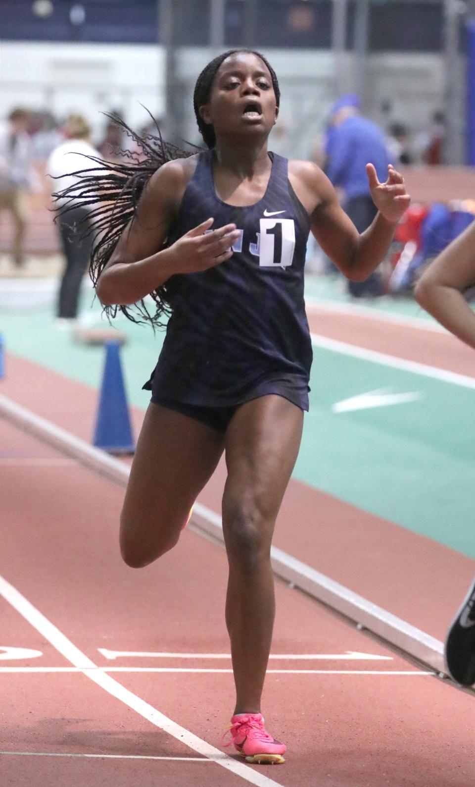 John Jay-East Fishkill's Estella Pouani won the Northern County 1000-meter run at the Rockland and Northern Counties track and field championships at the Armory Jan. 26, 2024.