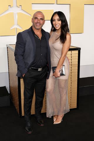 <p>Jamie McCarthy/Getty </p> Joe Gorga and Melissa Gorga attend the Netflix's "Lift" World Premiere