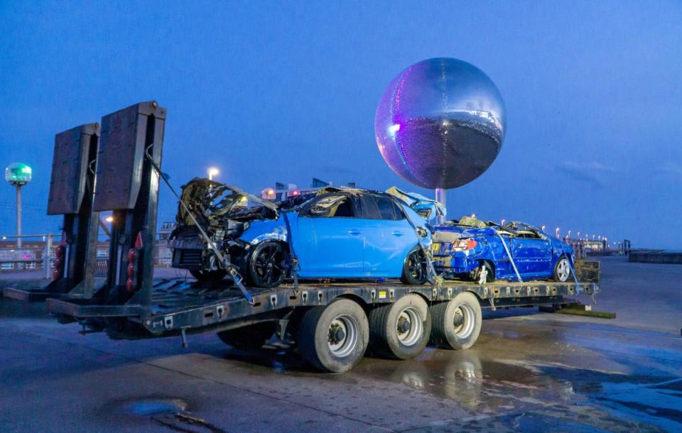 The cars being removed from the beach (Lee Long / SWNS)